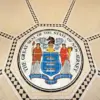 Das Große Siegel des Staates New Jersey auf einem gefliesten Boden