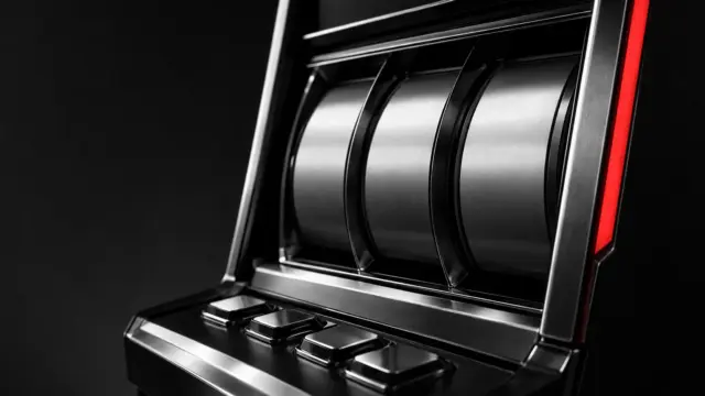 Monochrome casino slot machine representing Evoplay games joining Luckia’s Spanish online casino