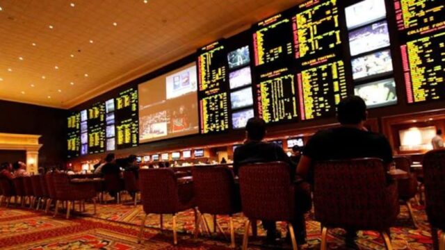 Schermen met live sport en odds voor het plaatsen van fysieke sportweddenschappen.