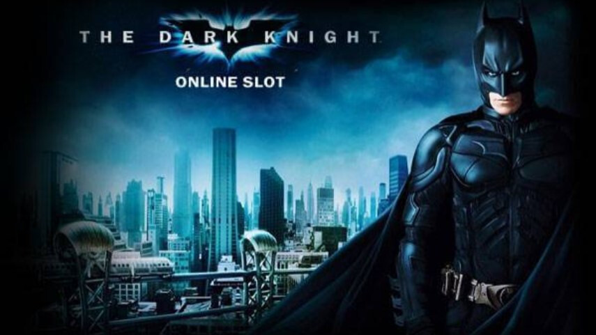 Batman overlooking Gotham City on the The Dark Knight online slot game screen