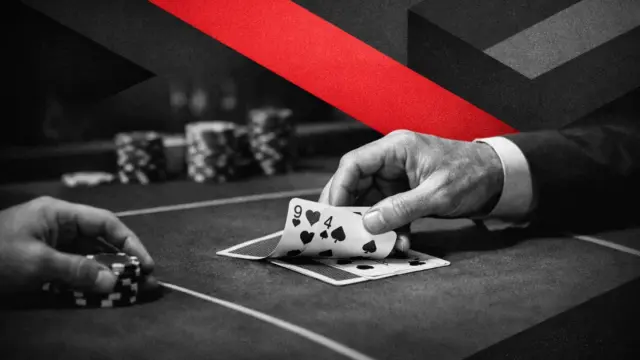 baccarat table at an online casino with cards