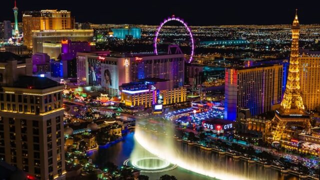 as Vegas Strip and Bellagio fountains illuminated at night