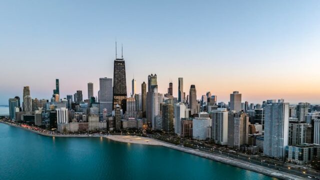 Chicago skyline along Lake Michigan with downtown skyscrapers at sunset