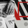 Hands placing arrow tokens on financial charts representing prediction market trends
