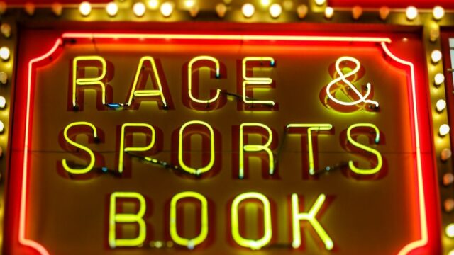 Neon Race and Sports Book sign at a sportsbook venue