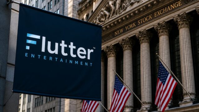 Flutter Entertainment banner displayed near the New York Stock Exchange building in New York City.