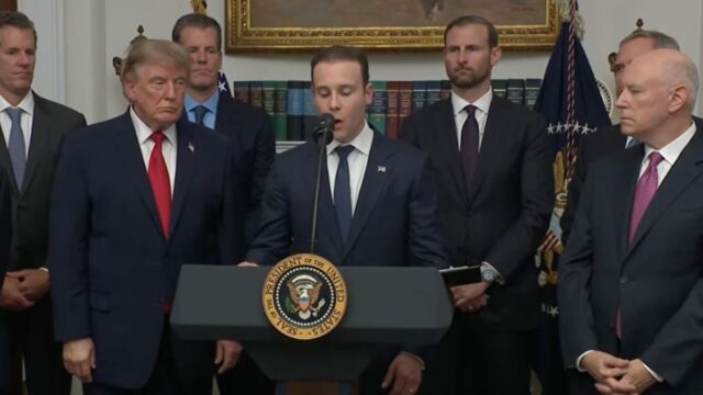 CFTC Chairman Mike Selig delivers a speech standing next President Trump at White House Crypto event